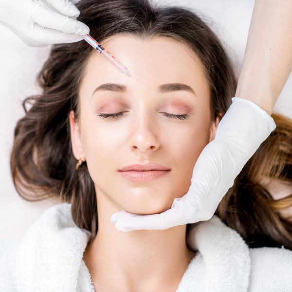 woman receiving facial injection