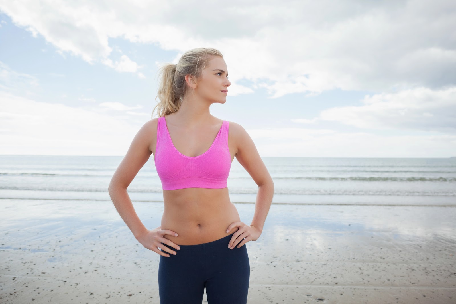 slim athletic woman on the beach