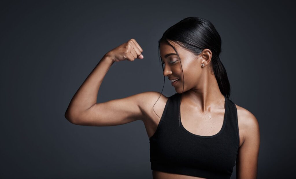 woman flexing arm