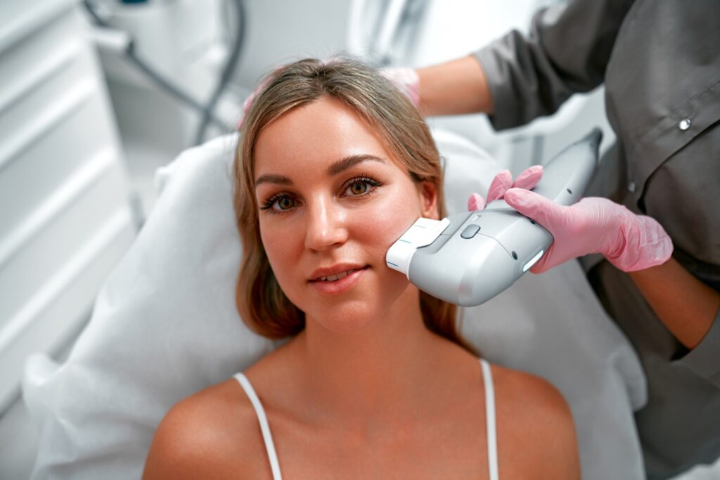 woman receiving ipl treatment on face